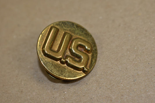 Disque de col monogramme US