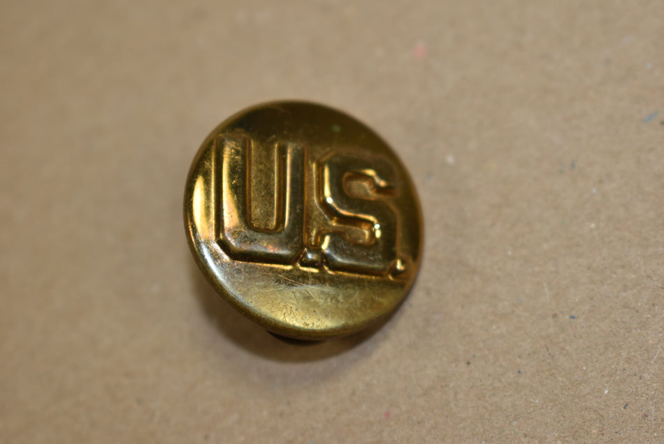 Disque de col monogramme US