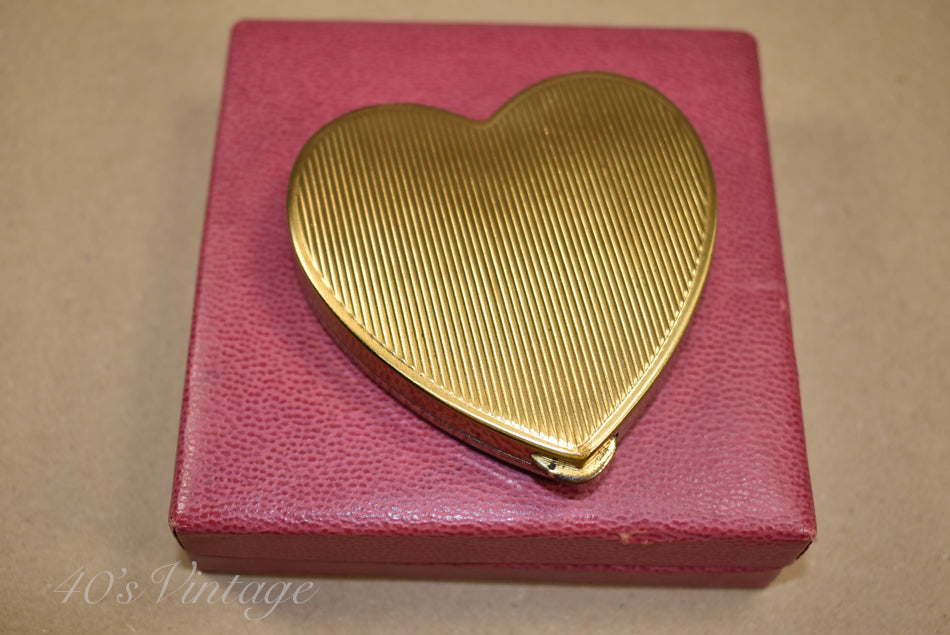 Poudrier dans sa boîte d'origine