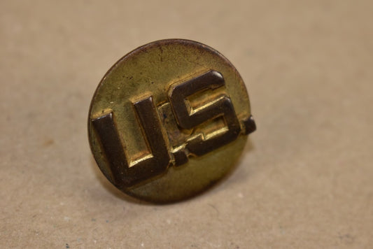Disque de col monogramme US