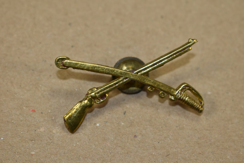 Insigne de fusil et de sabre croisés