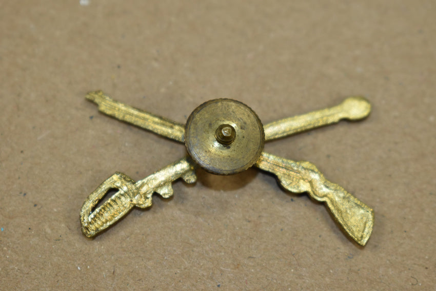 Insigne de fusil et de sabre croisés