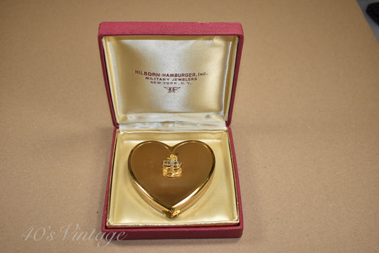 Poudrier dans sa boîte d'origine