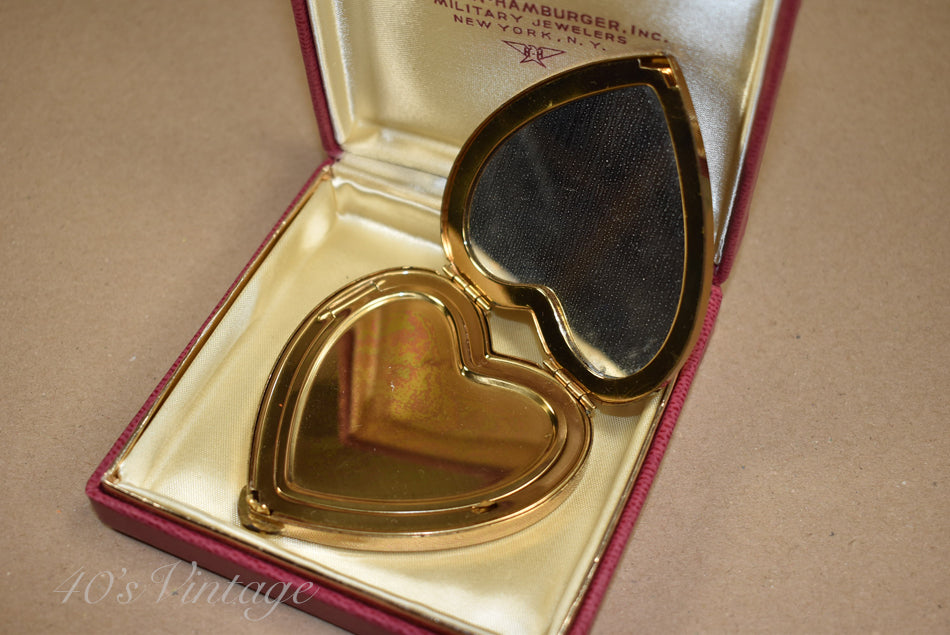 Poudrier dans sa boîte d'origine